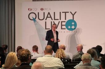 Mike Turner speaking at Quality Live 25