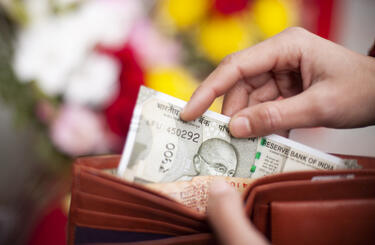 Indian money in a wallet 