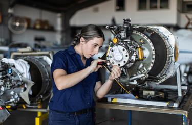 Aircraft engineer working in a manufacturing facility