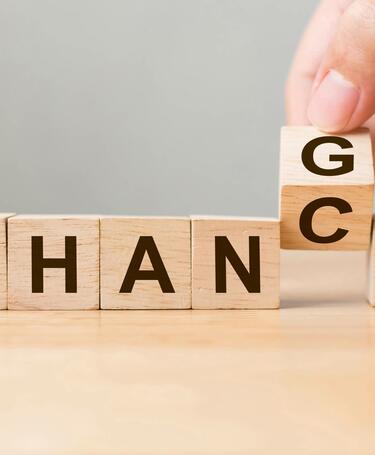 Chance or change? Wooden blocks spelling out chance or change