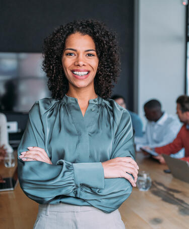 IRCA regrade webinar Solo woman professional in office smiling