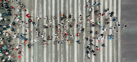 High Angle View Of People forming and arrow on the street