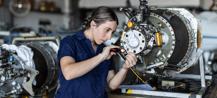 Aircraft engineer working in a manufacturing facility